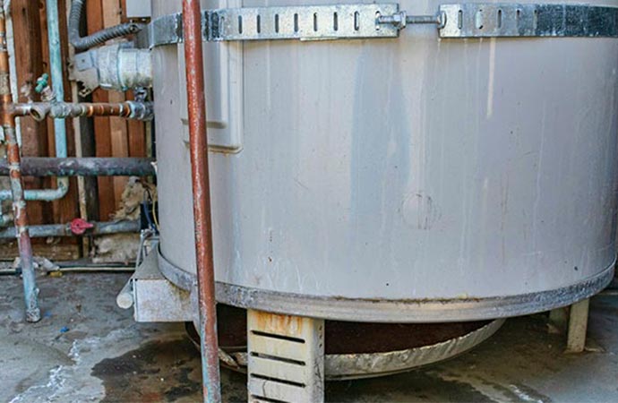 Hot water heater leak restoration service.