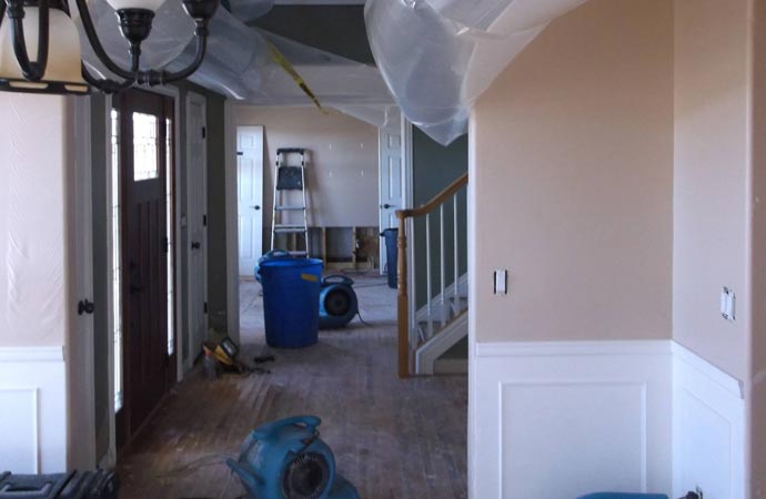 Professional storm and flood damage restoration services in action, ensuring effective and thorough recovery.