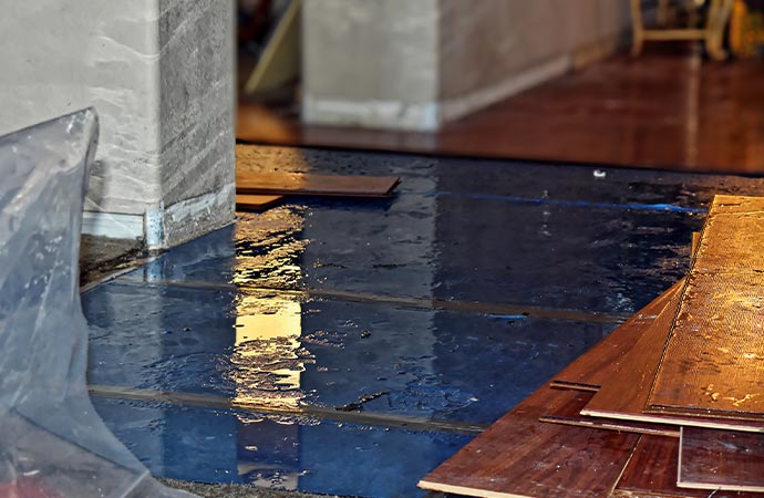 water damage to floor with water restoration